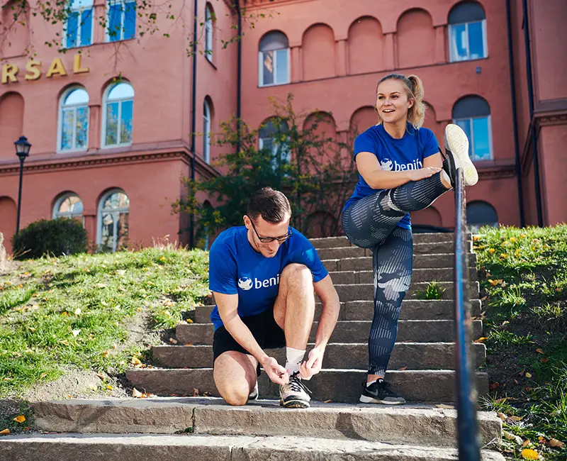 HR technology company staff stretching outside office